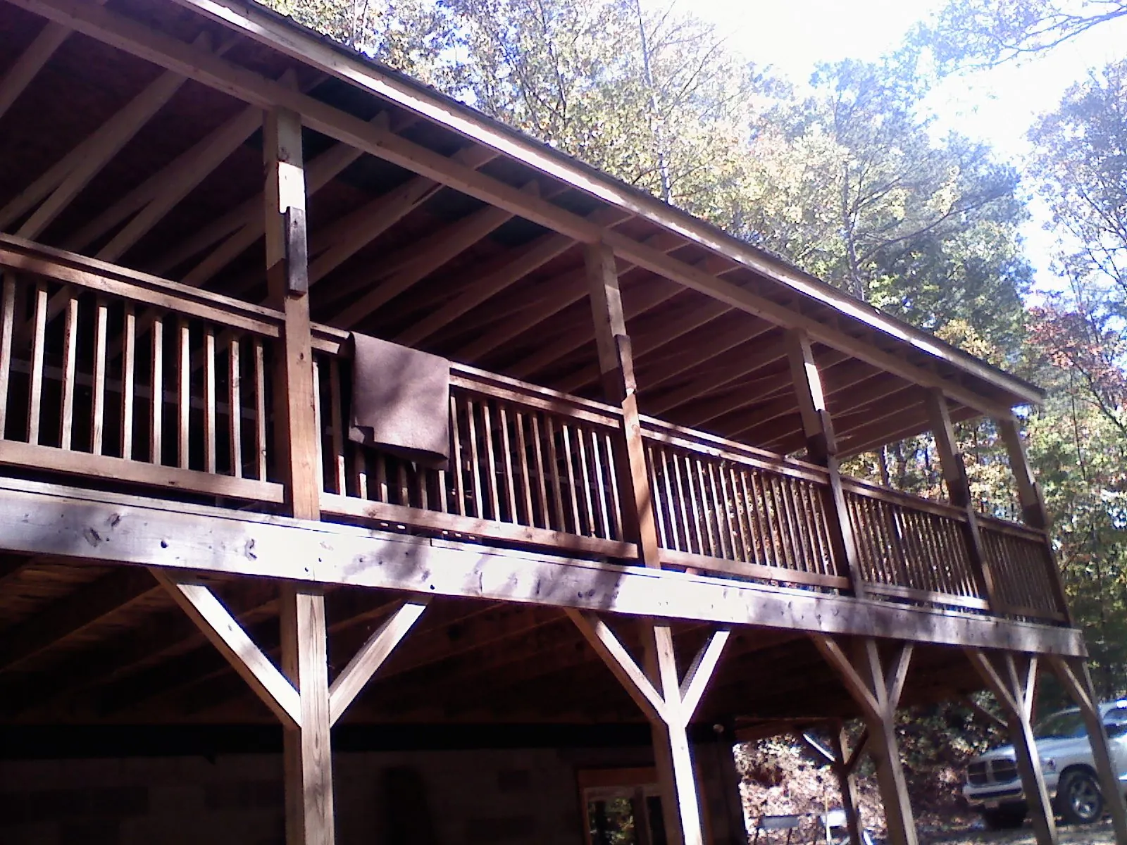 Timber framing under a new elevated porch and deck — Roof Leak Repair in Blodgett by Roofing Brothers